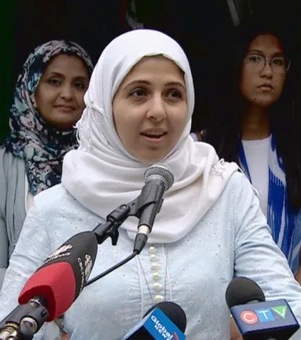 Noor Al-Henedy sitting on steps